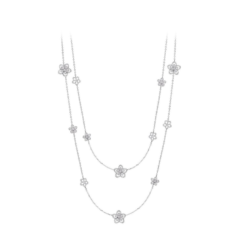 White gold long necklace with diamond flowers