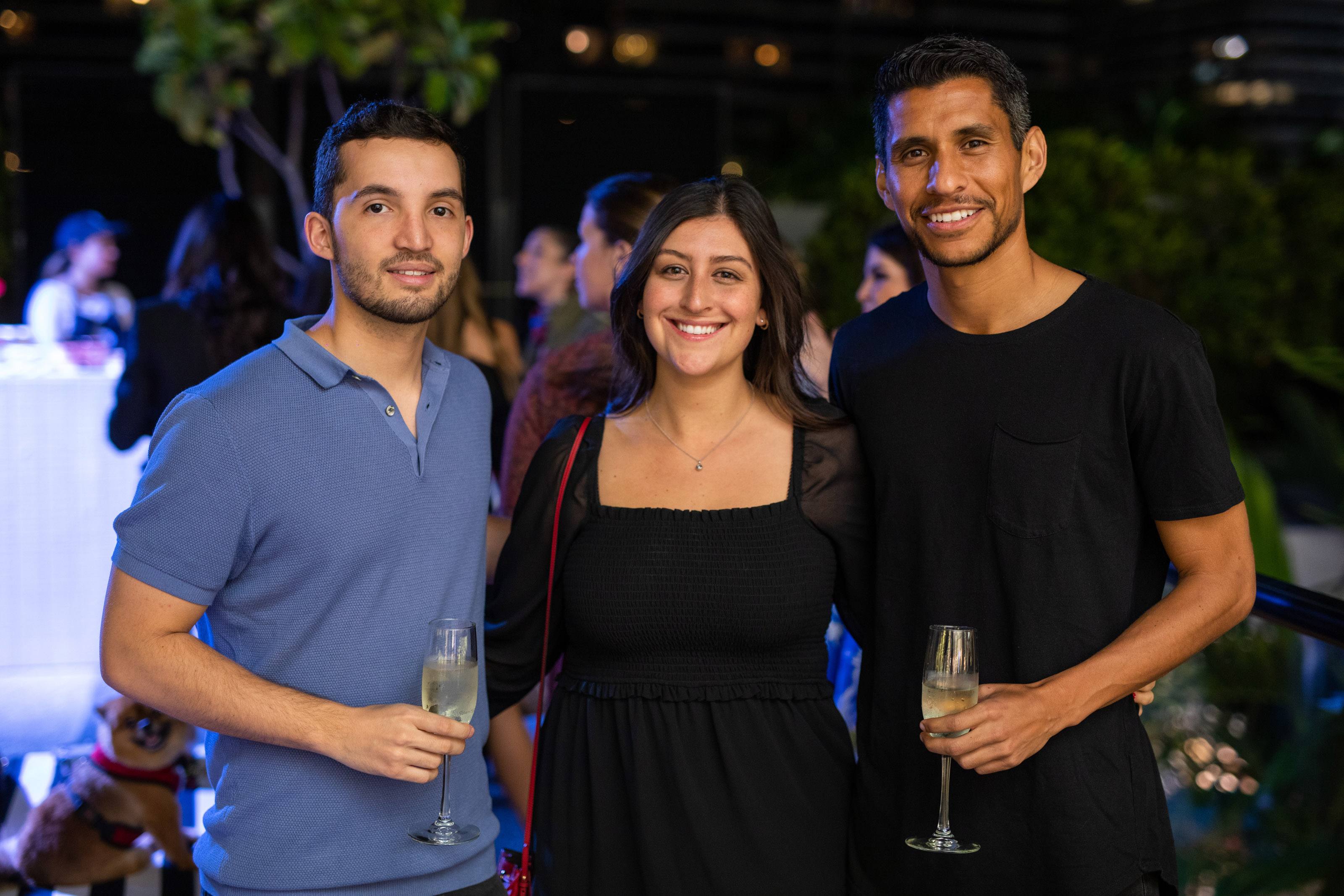 A group of people smile for a photo