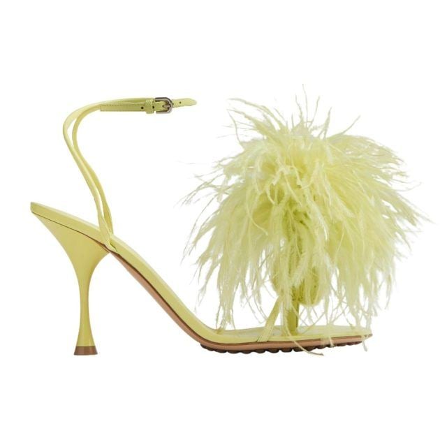 Green sandals with fur detail on the toe