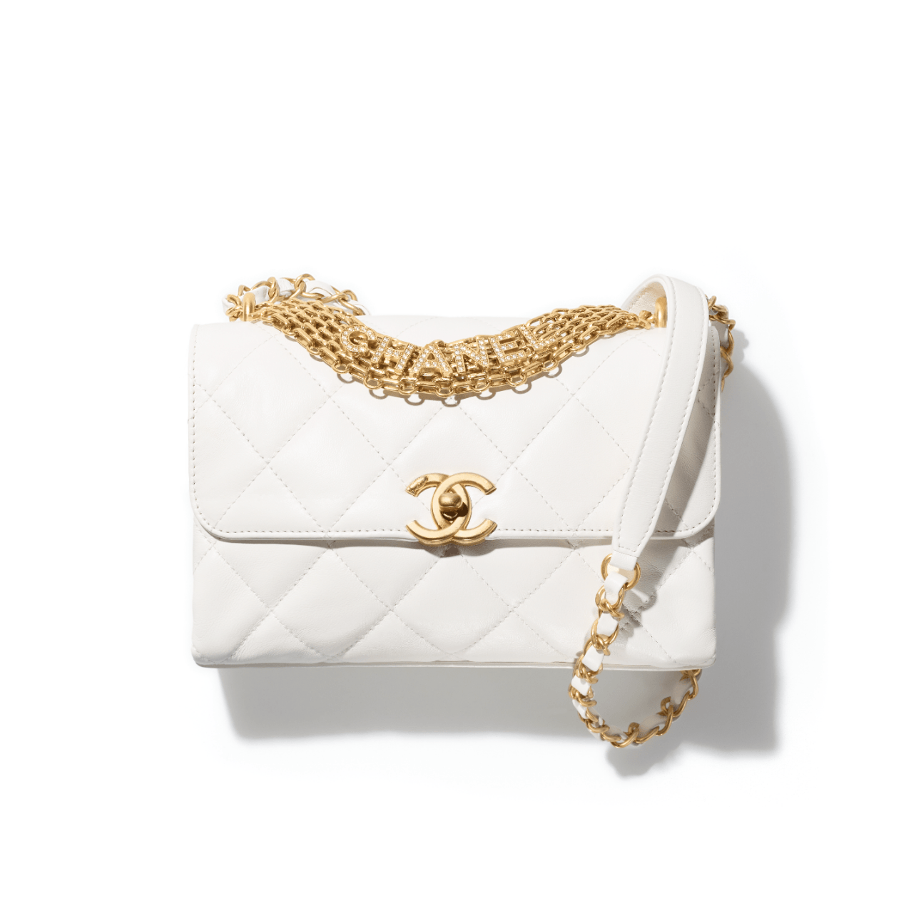 white flap chanel bag with gold hardware