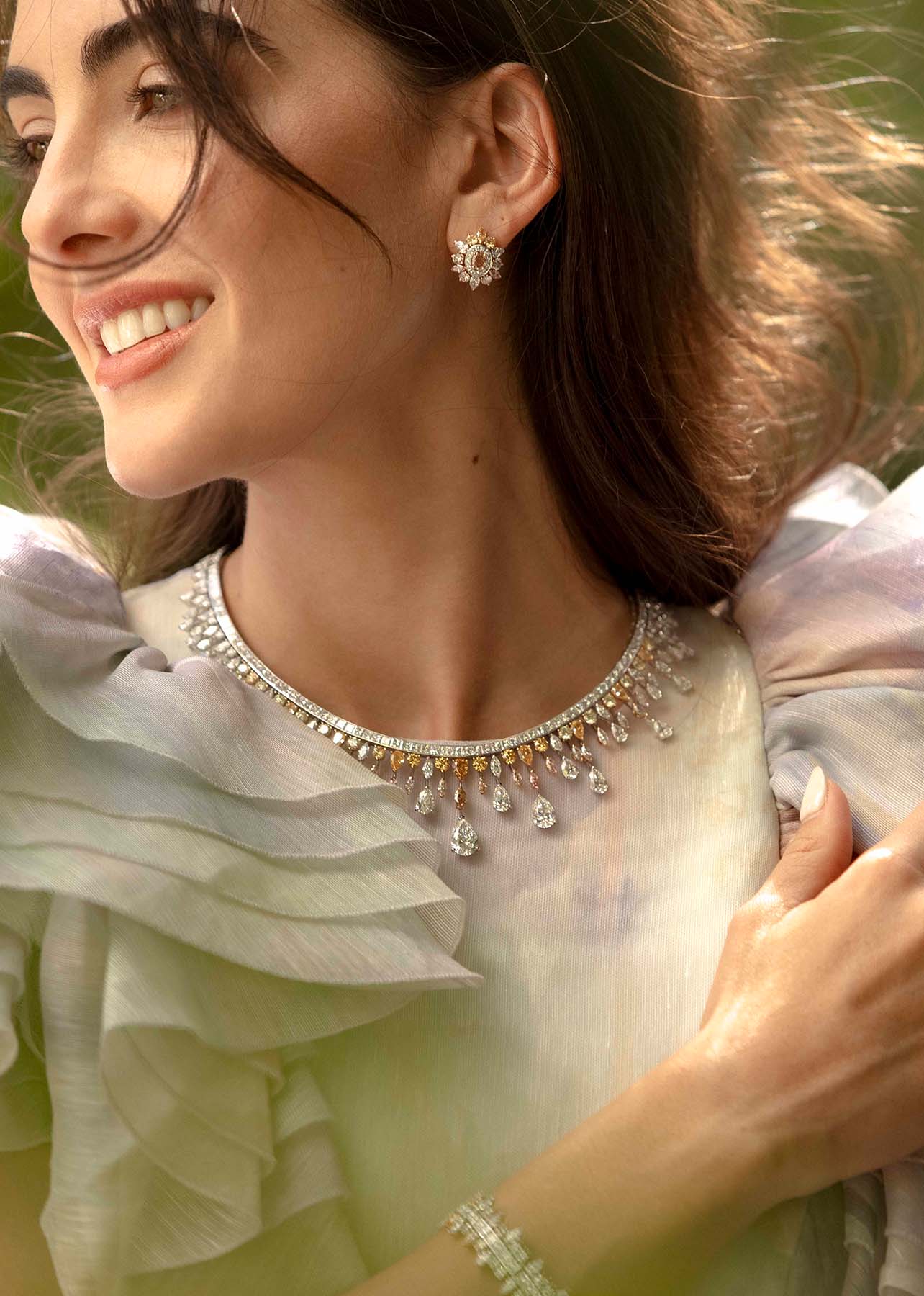 Close up shot of model with focus on high jewelry from De Beers