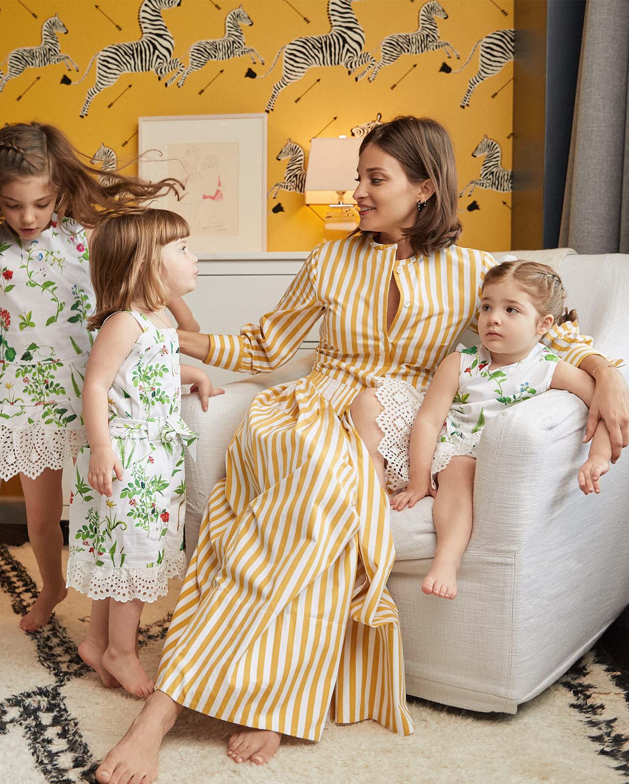 Portrait image of Maria Duenas and her three daughters