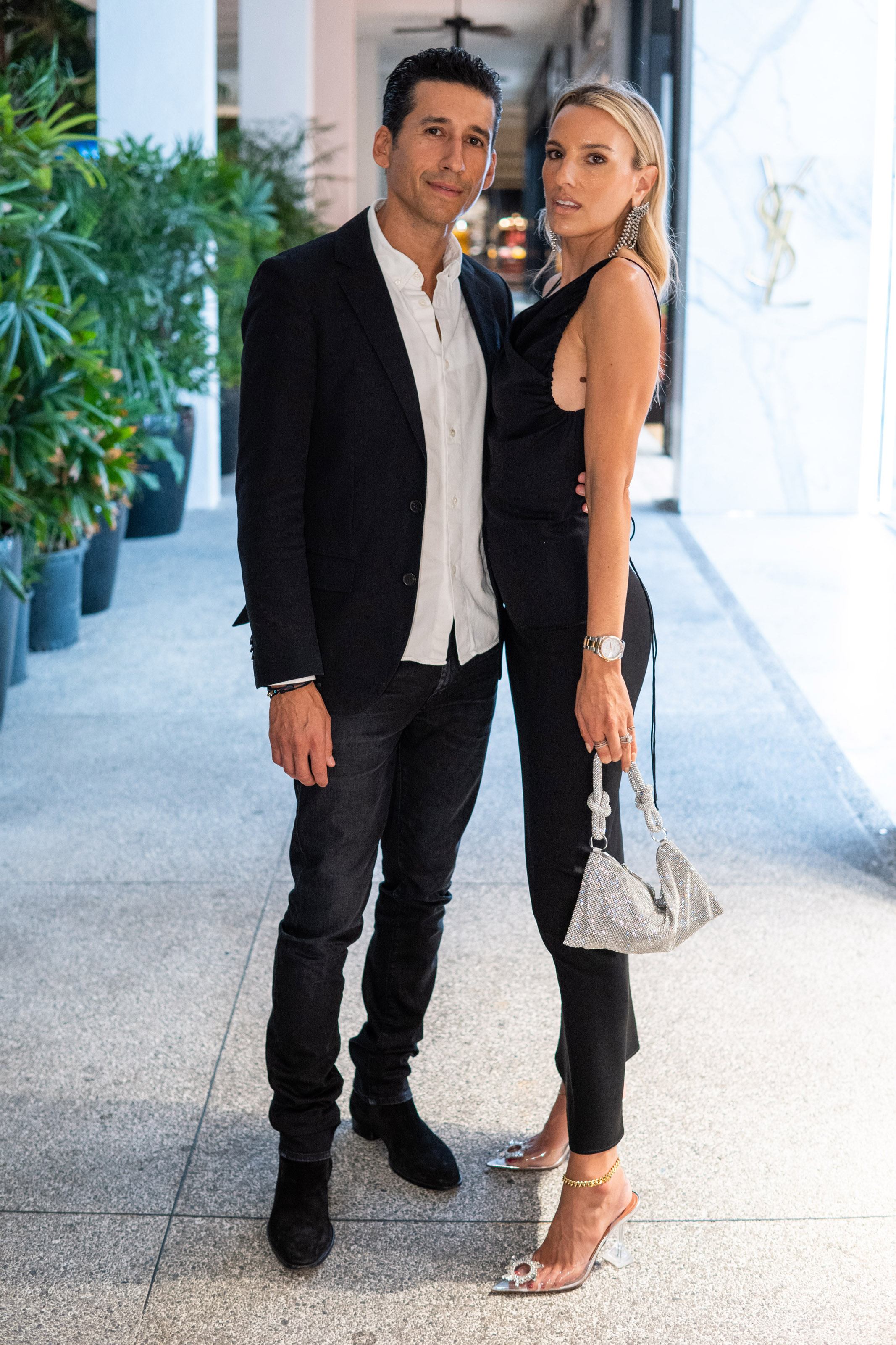 Man and wife pose for a photo together