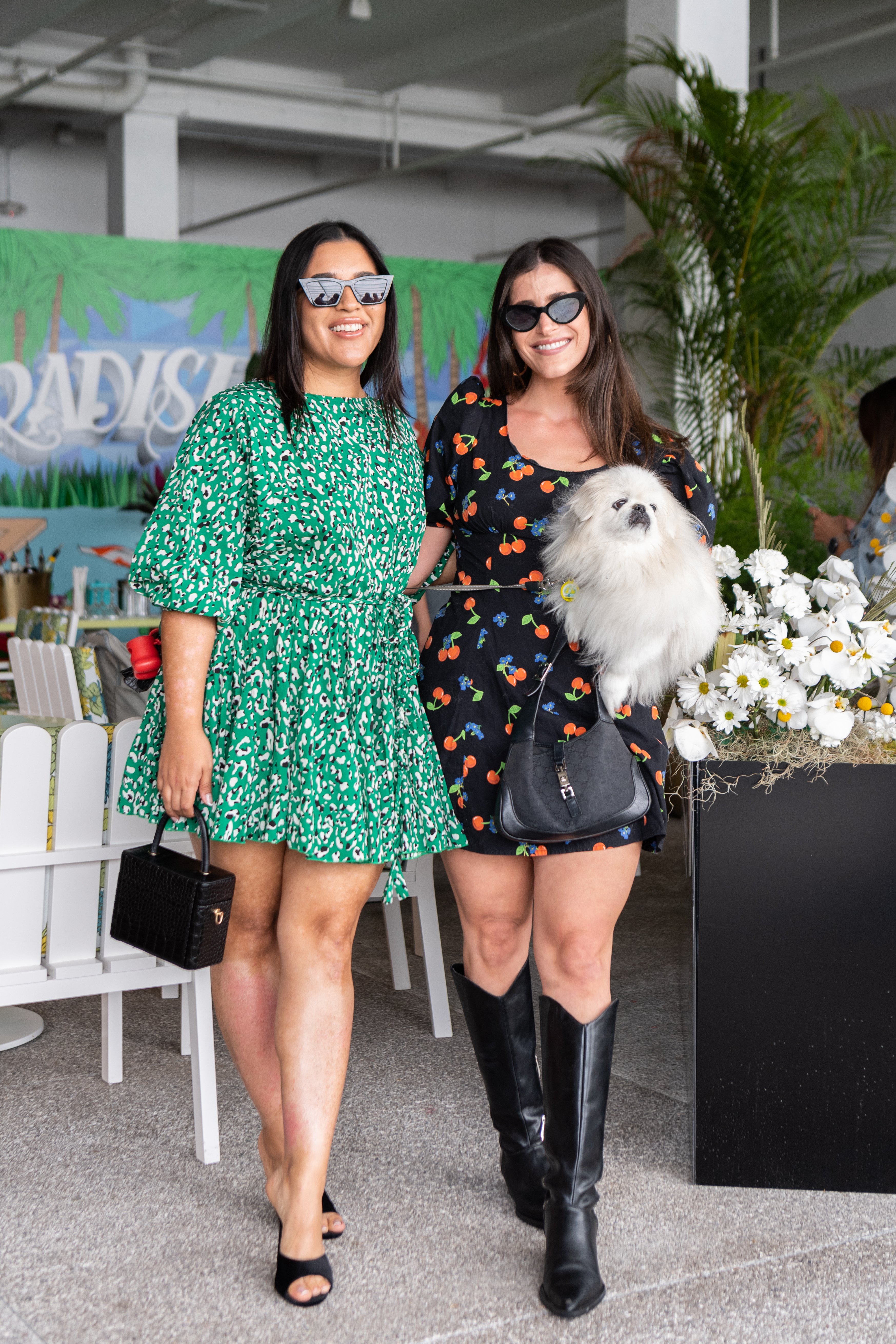 Two women smile for a photo together