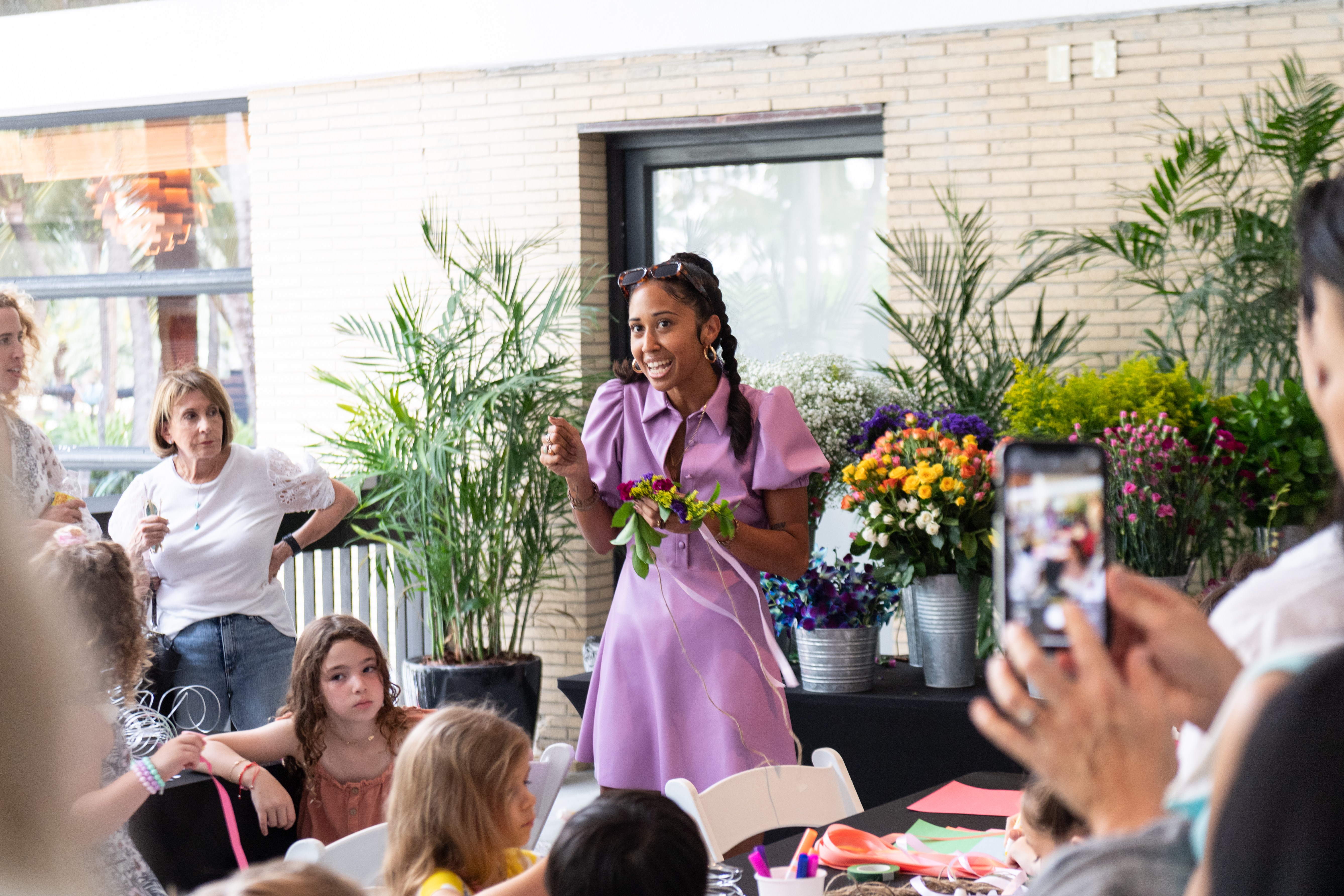 Woman speaking to a crowd of people