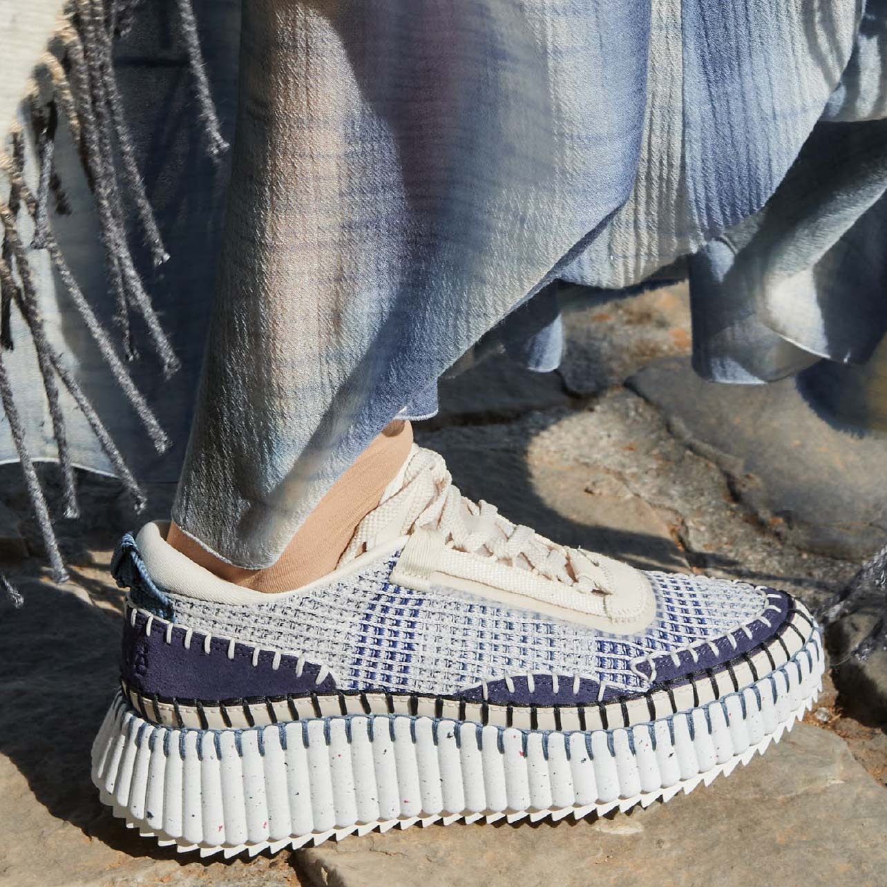 Womens sneakers with blue, white and tan woven pattern