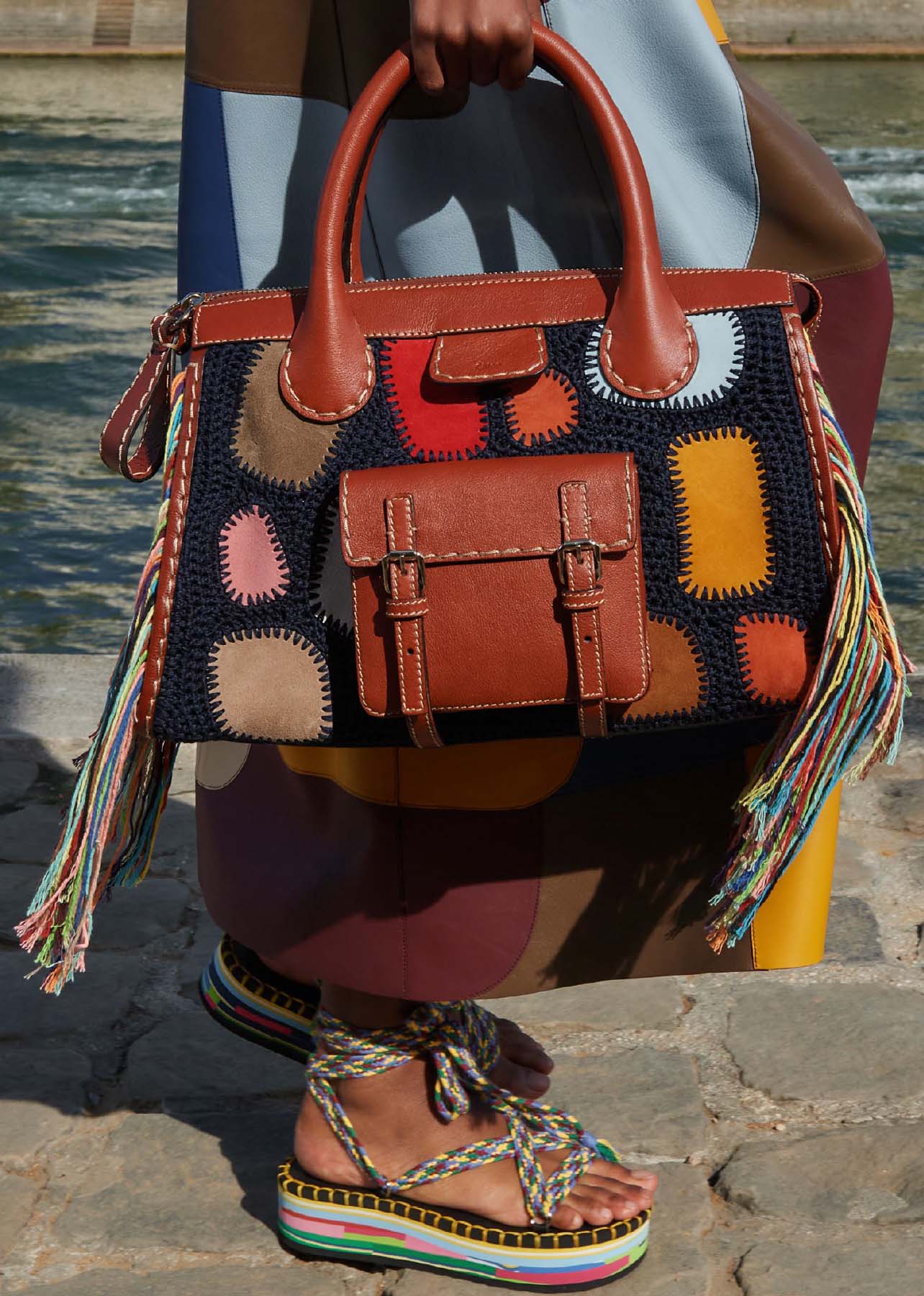 Brown leather tote bag with woven detailing