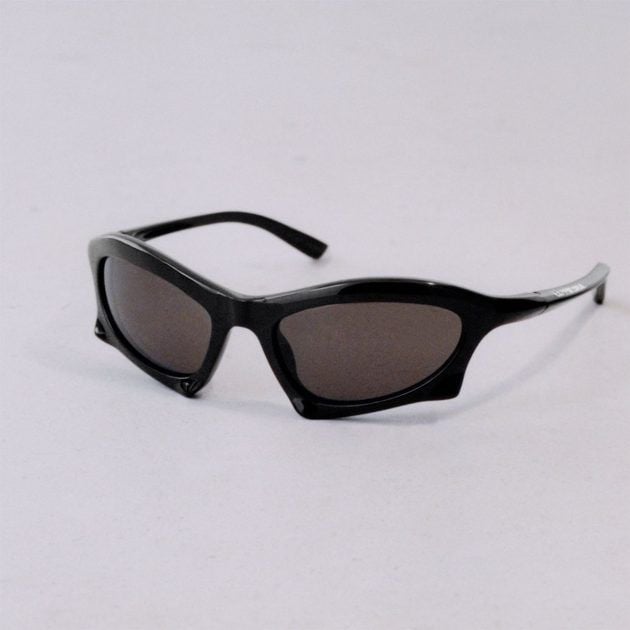 Black framed sport-style sunglasses with black lenses