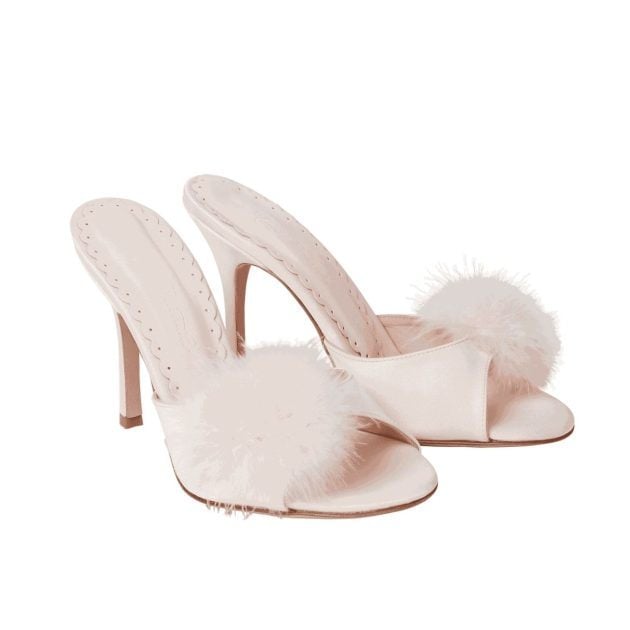 Light pink heeled sandals with fur puff on the toe