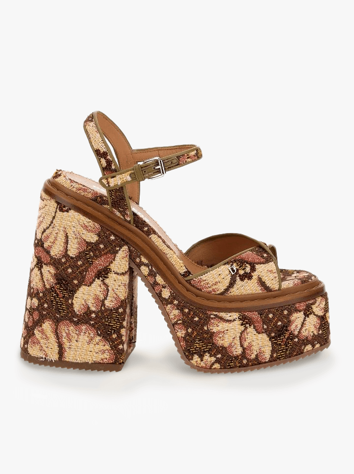 She also probably wants breakfast in bed, a shoulder rub, and a hot bath, but it might be more realistic for you to gift her these DSquared jacquard platform sandals.