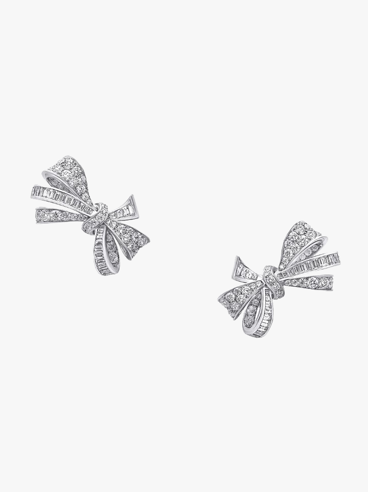 We can’t promise that they’ll drown out the noise of screaming children, but they will help make her ears feel good. Graff’s Tilda’s Bow diamond stud earrings feature pave diamonds and white gold.