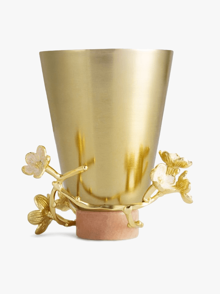 Gift her this Michael Aram bud vase from the Cherry Blossom collection—complete with a rose marble slab base—and earn constant gold stars by bringing her a single flower to put in it each time you see her.