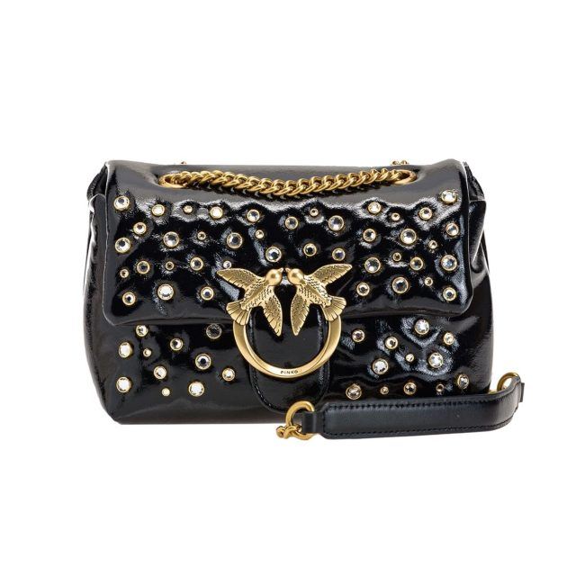 black patent leather top handle bag with gold hardware and rhinestone detailing