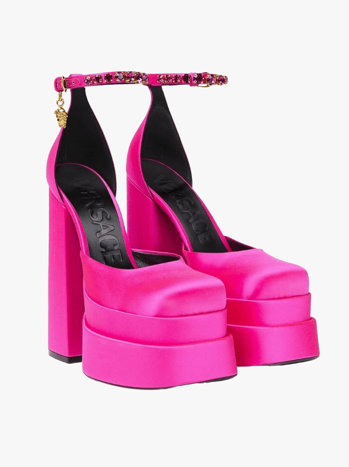 It takes a village. For the woman in your life who perhaps didn’t birth your children, but you couldn’t live without, they’ve made Versace’s Medusa Aevitas platform pumps.