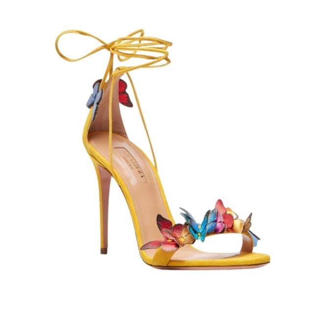 yellow heels with multicolored butterfly detailing