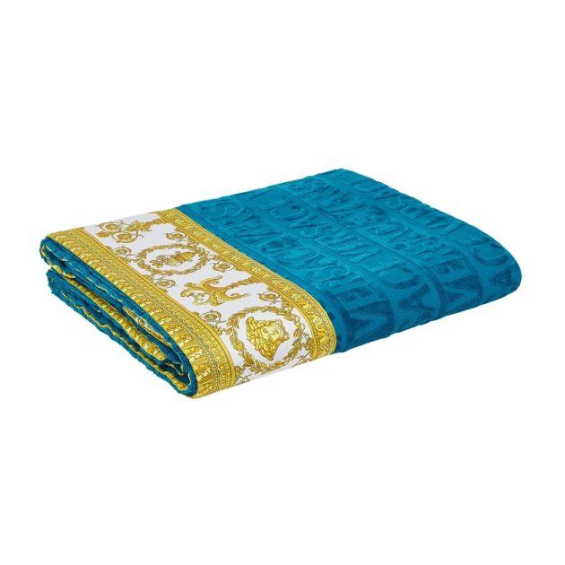 Blue beach towel with gold trimming