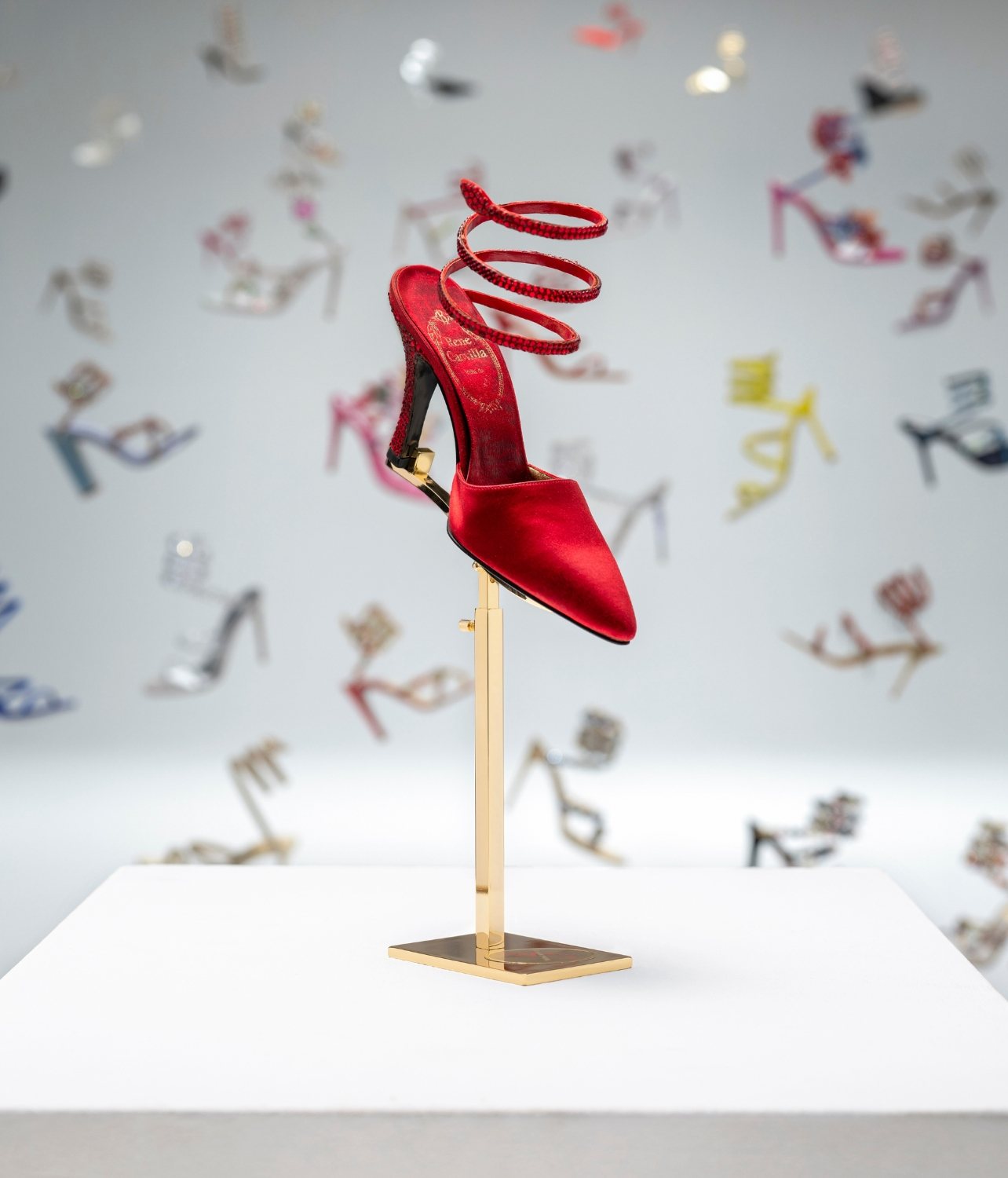 Portrait of René Caovilla 1975 archival red Cleo pump