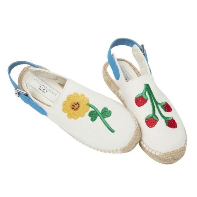 White espadrilles with blue back buckle and embroidered sunflower and strawberries