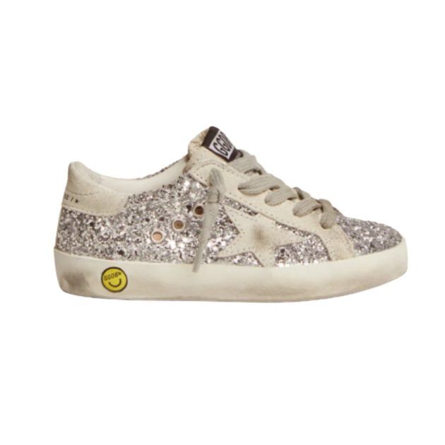 White sneakers with gold star detailing