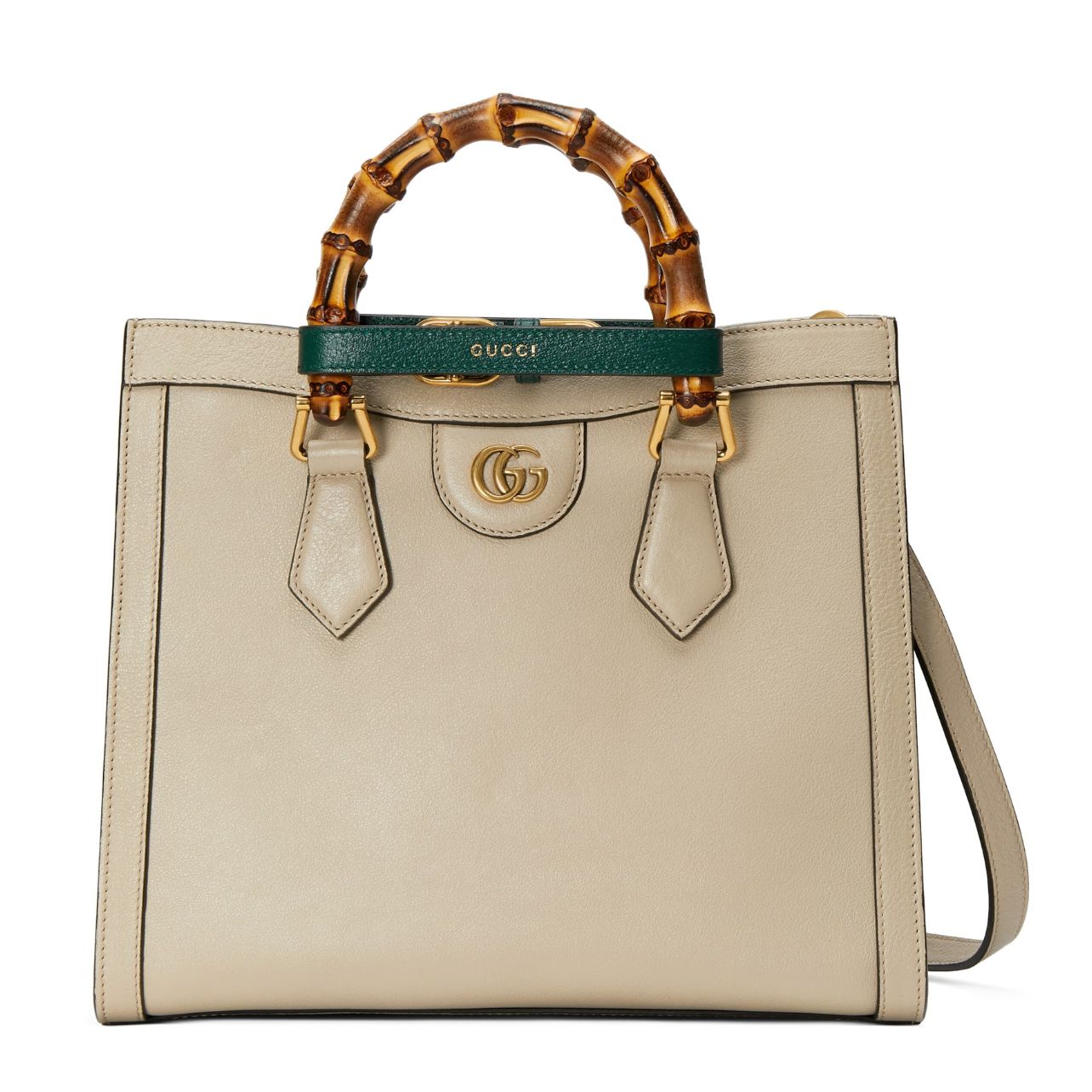 Tan leather tote bag with bamboo handles