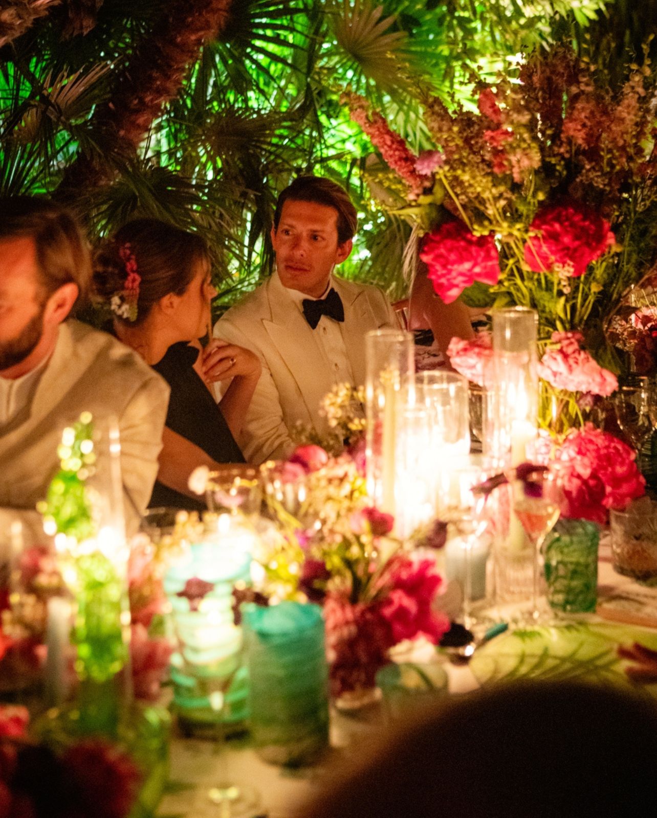 Edgardo Osorio dining with guests