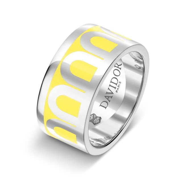 Silver ring with yellow arch detailing