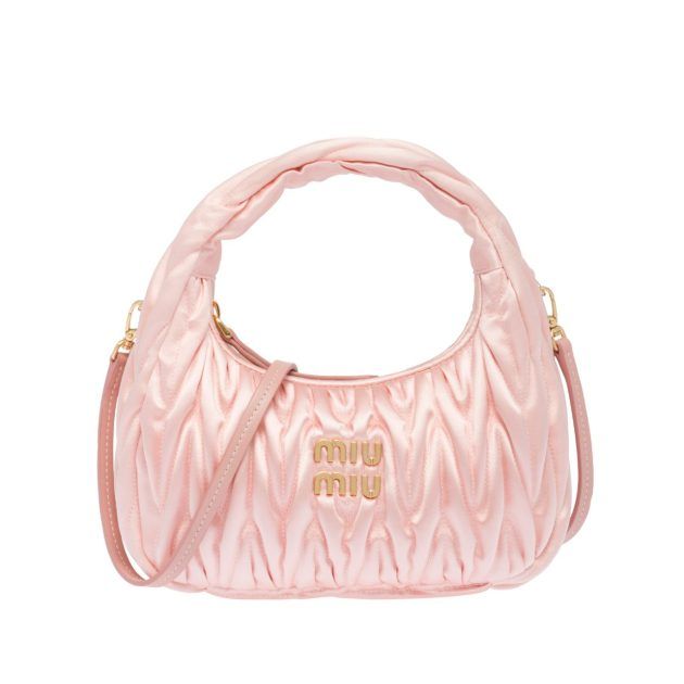 light pink quilted bag with miu miu logo on front