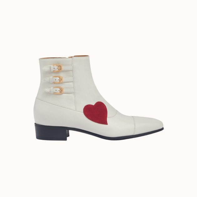 White leather boot with red heart and buckle detailing