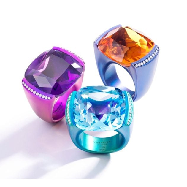 Trio of cocktails rings in purple, blue, and turquoise colored titanium and stones