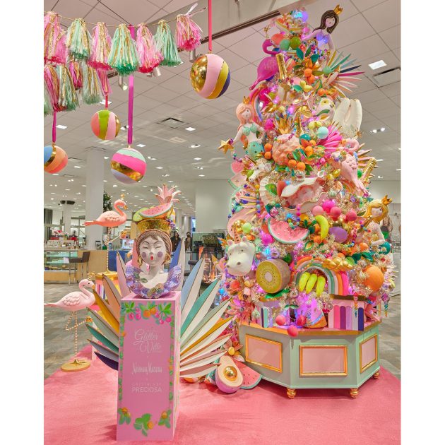 Tropical inspired tree featuring pink flamingoes, mermaids, and colorful ornaments