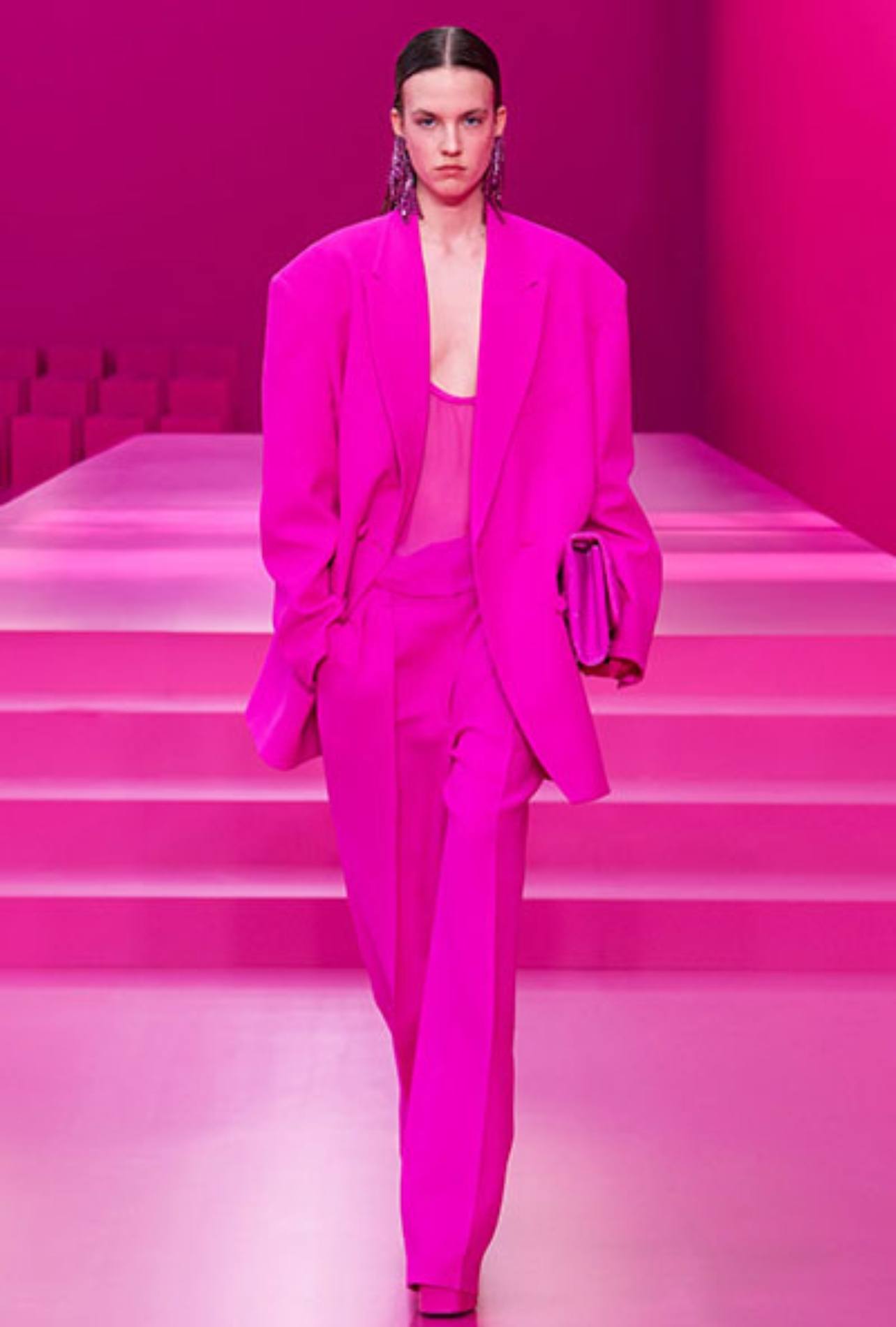 Model in Valentino fashion show wearing a head-to-toe pink look