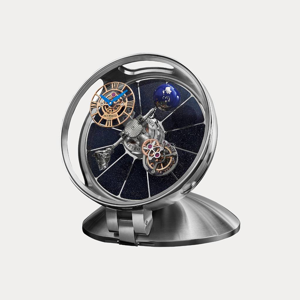 You’re into astronomy. He’s into timepieces. Instant 50/50 gift with Jacob & Co.’s Astronomia table clock, made from stainless steel and featuring a four-armed movement that rotates and floats through a mineral crystal– and stainless steel–bound space.