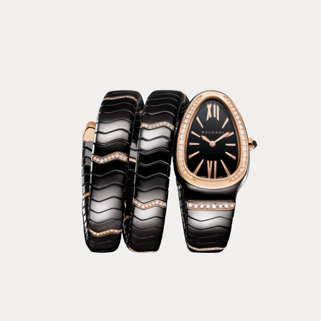 Bulgari understands it’s sometimes hard to decide whether she’d prefer a watch or a bracelet. Check both boxes with their Serpenti Spiga watch in black ceramic with 18K rose gold bezel and single elements set with diamonds. It’s even water resistant to 30 meters.                                                             