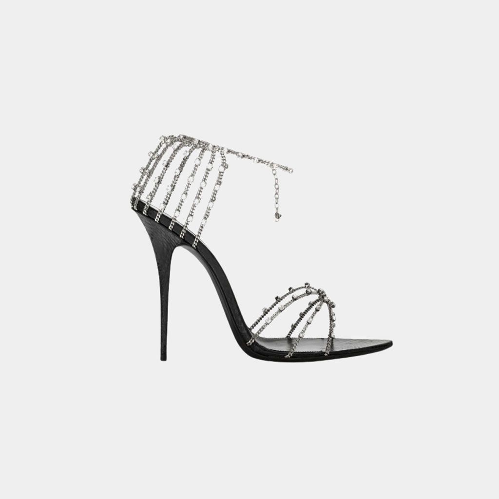Seriously, asking yourself if she “needs” something is your first mistake. Second mistake: not getting her Saint Laurent’s Alex Chain Sandals in Lacquered Ayers.                                                                                                                                                