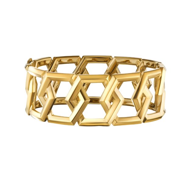 Gold cuff bracelets with cutouts