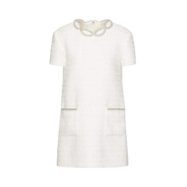 Portrait of white wool tweed short dress with silver embellishments