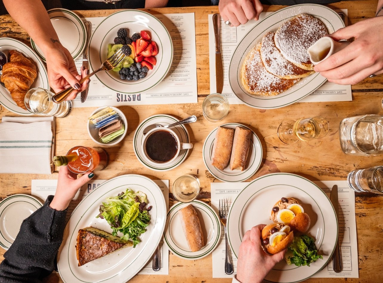 Brunch food spread at Pastis New York