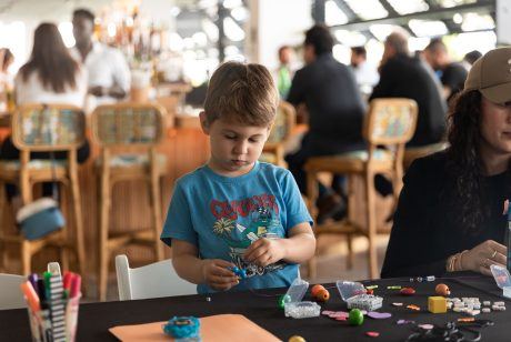 A variety of images showcasing the Bepoke Bal Harbour Children’s Art Classes. Images include guests in attendance, artists Lauren Shapiro and Morel Doucet, and children creating art.