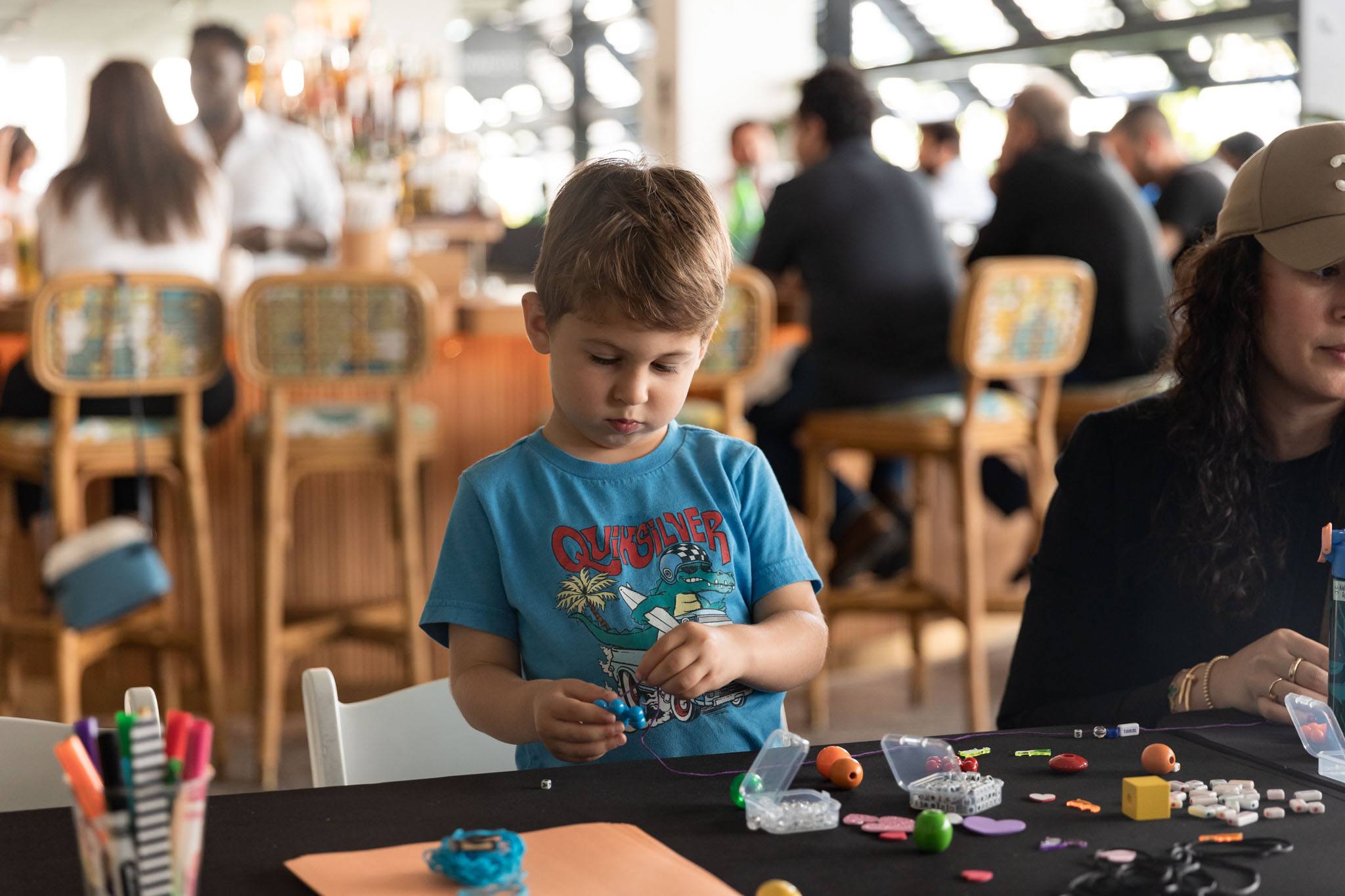 A variety of images showcasing the Bepoke Bal Harbour Children’s Art Classes. Images include guests in attendance, artists Lauren Shapiro and Morel Doucet, and children creating art.