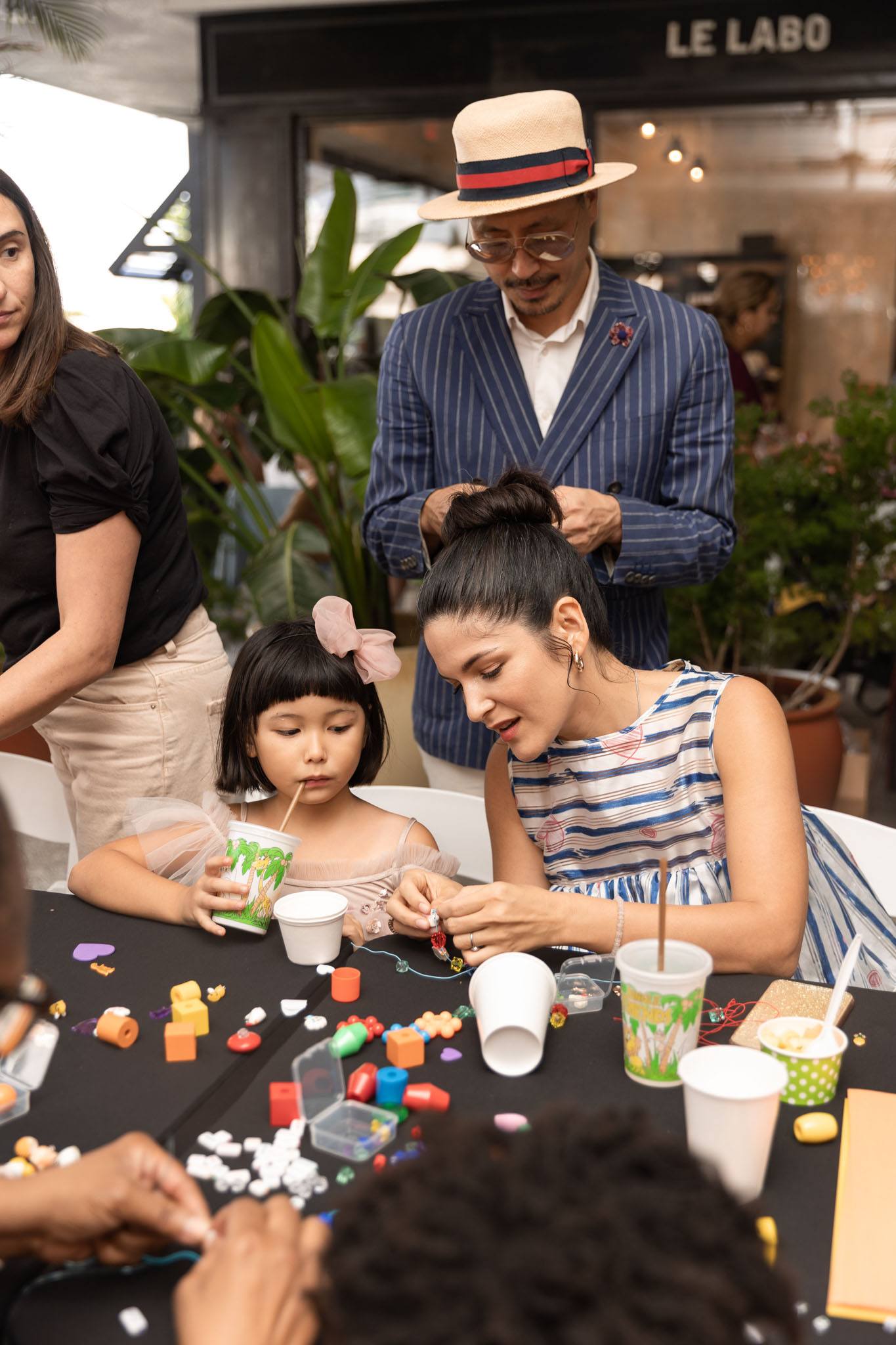 A variety of images showcasing the Bepoke Bal Harbour Children’s Art Classes. Images include guests in attendance, artists Lauren Shapiro and Morel Doucet, and children creating art.