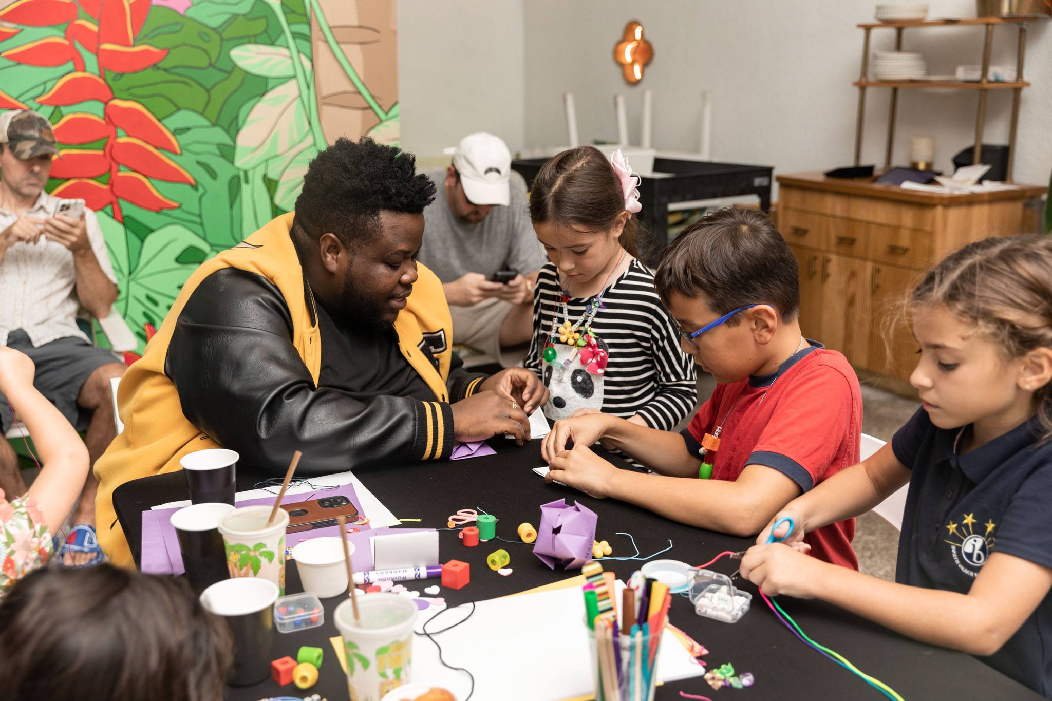 A variety of images showcasing the Bepoke Bal Harbour Children’s Art Classes. Images include guests in attendance, artists Lauren Shapiro and Morel Doucet, and children creating art.