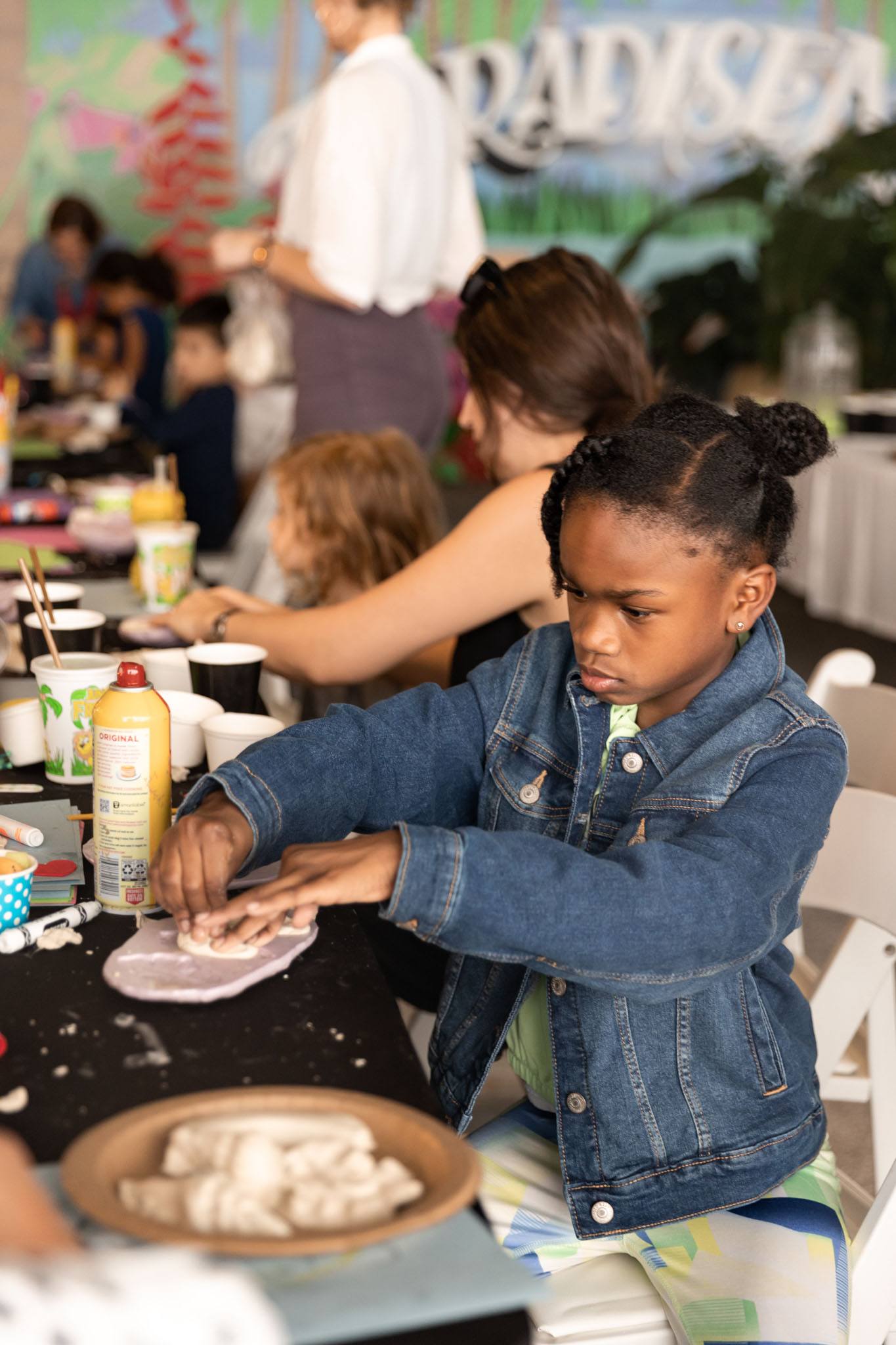 A variety of images showcasing the Bepoke Bal Harbour Children’s Art Classes. Images include guests in attendance, artists Lauren Shapiro and Morel Doucet, and children creating art.