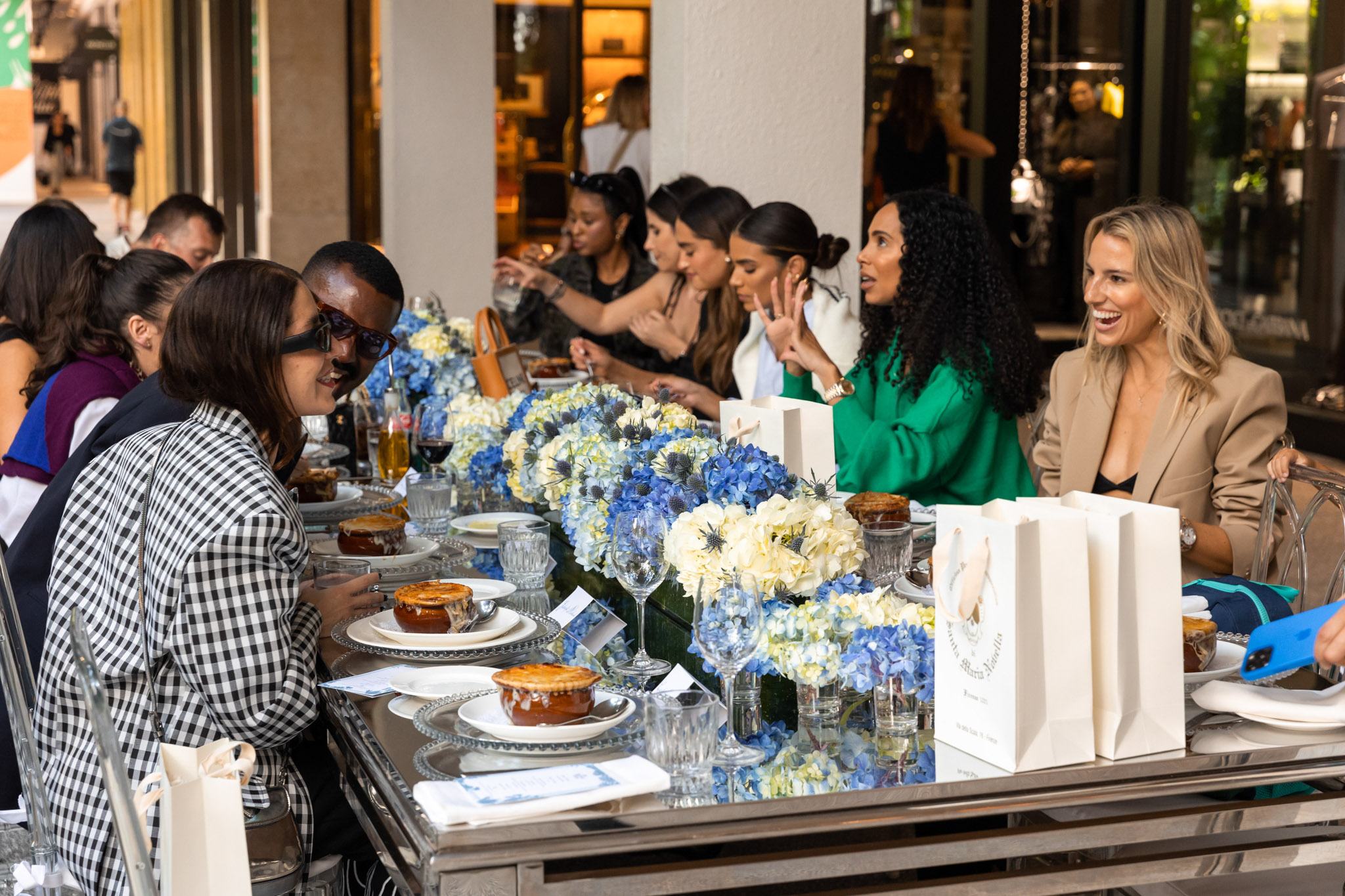 A variety of images showcasing Bal Harbour Shops’ Thanksharing Celebration event. Images include guests in attendance, table décor, and food featured at the event.