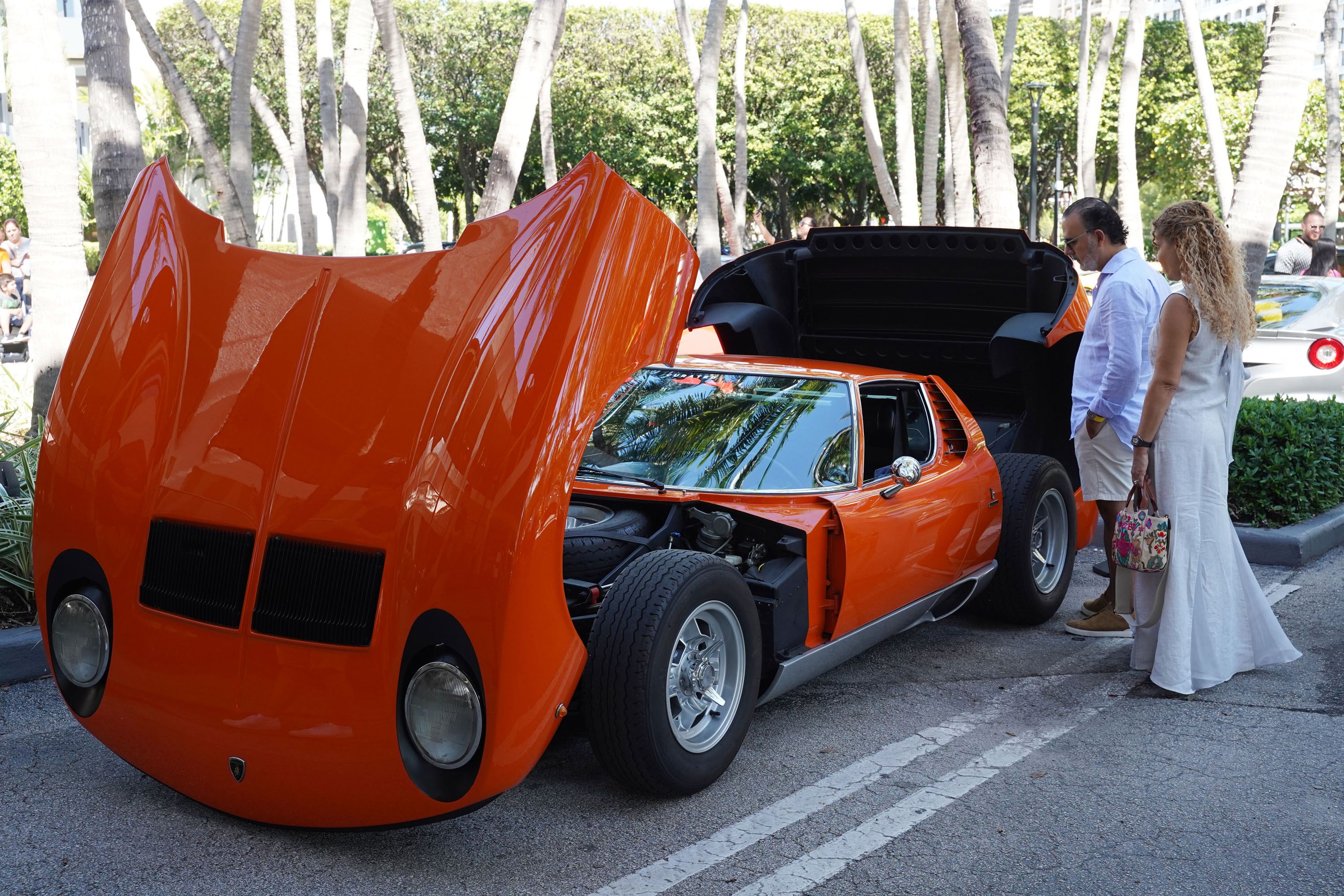 A variety of images showcasing the Collector’s Car Show hosted by Bal Harbour Shops during Bespoke Bal Harbour. Images include guests in attendance, rare and exotic cars showcased at the event, and watched from Richard Mille.