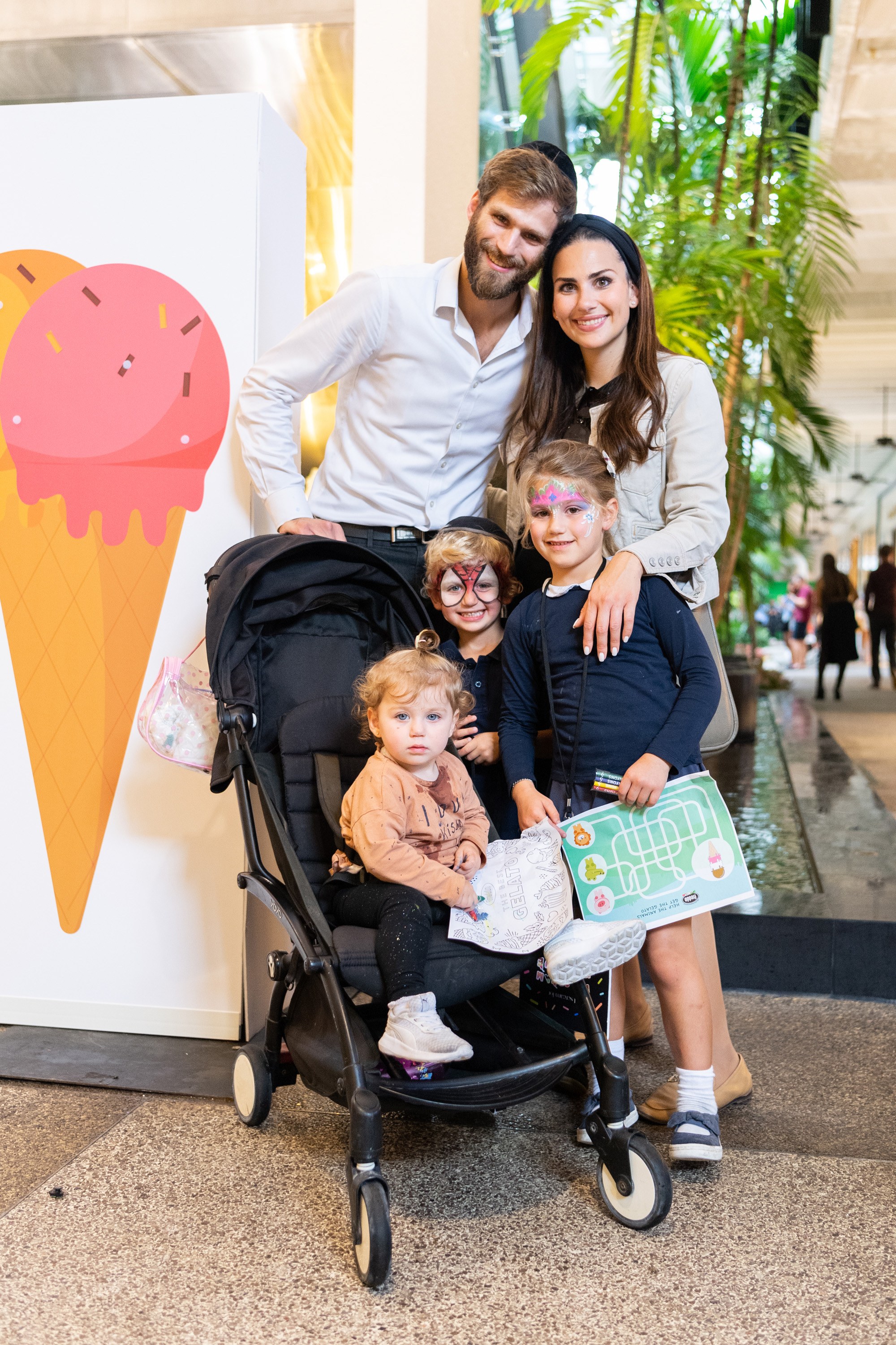 A variety of images showcasing the fourth annual “Ice Cream We Love” event. Images include guests in attendance, ice cream treats and setup, and activities featured at the event including games, face painting, and performances.