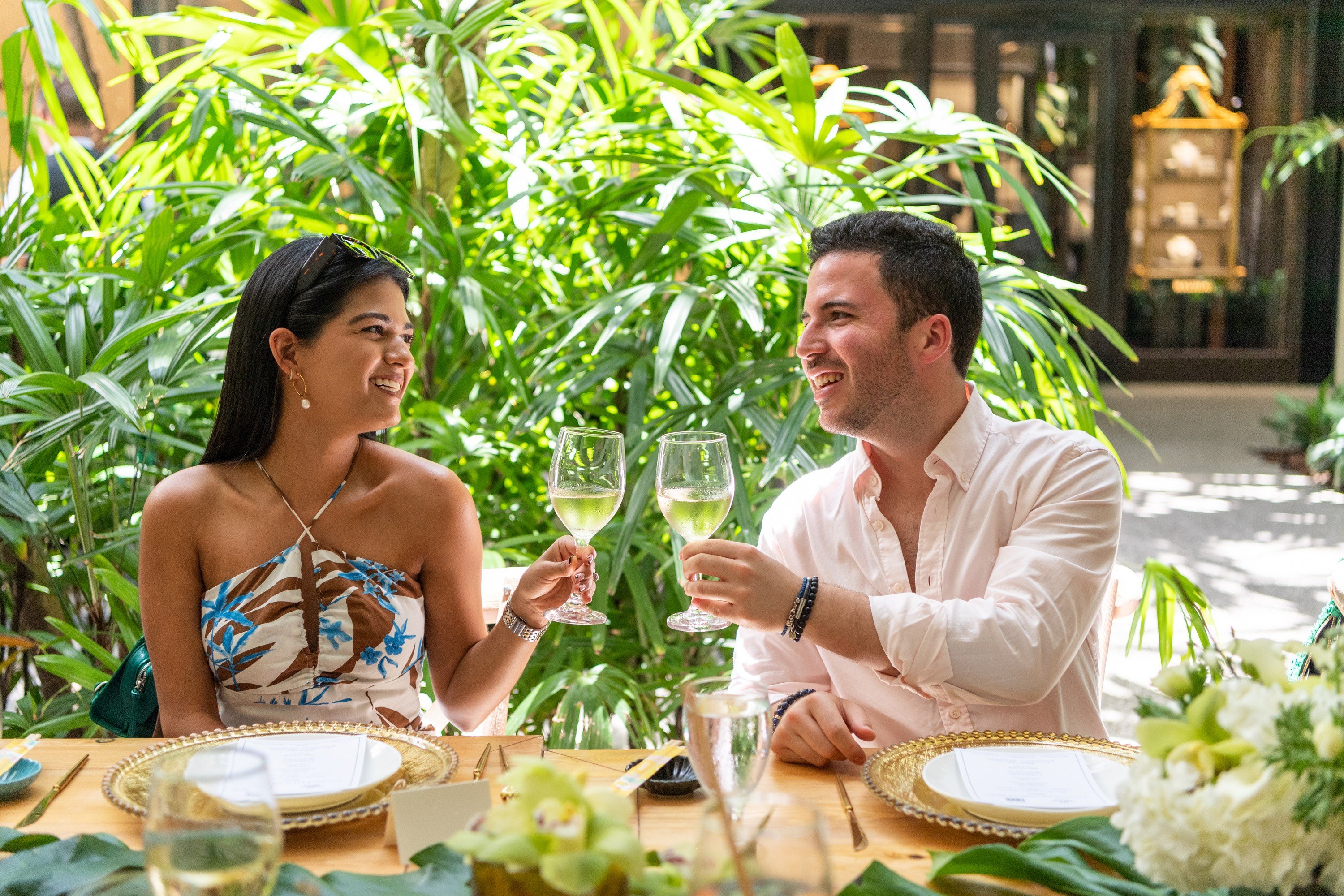 A variety of images showcasing “A Taste of Bal Harbour Shops”. Images include guests in attendance, table décor, and food featured at the event.