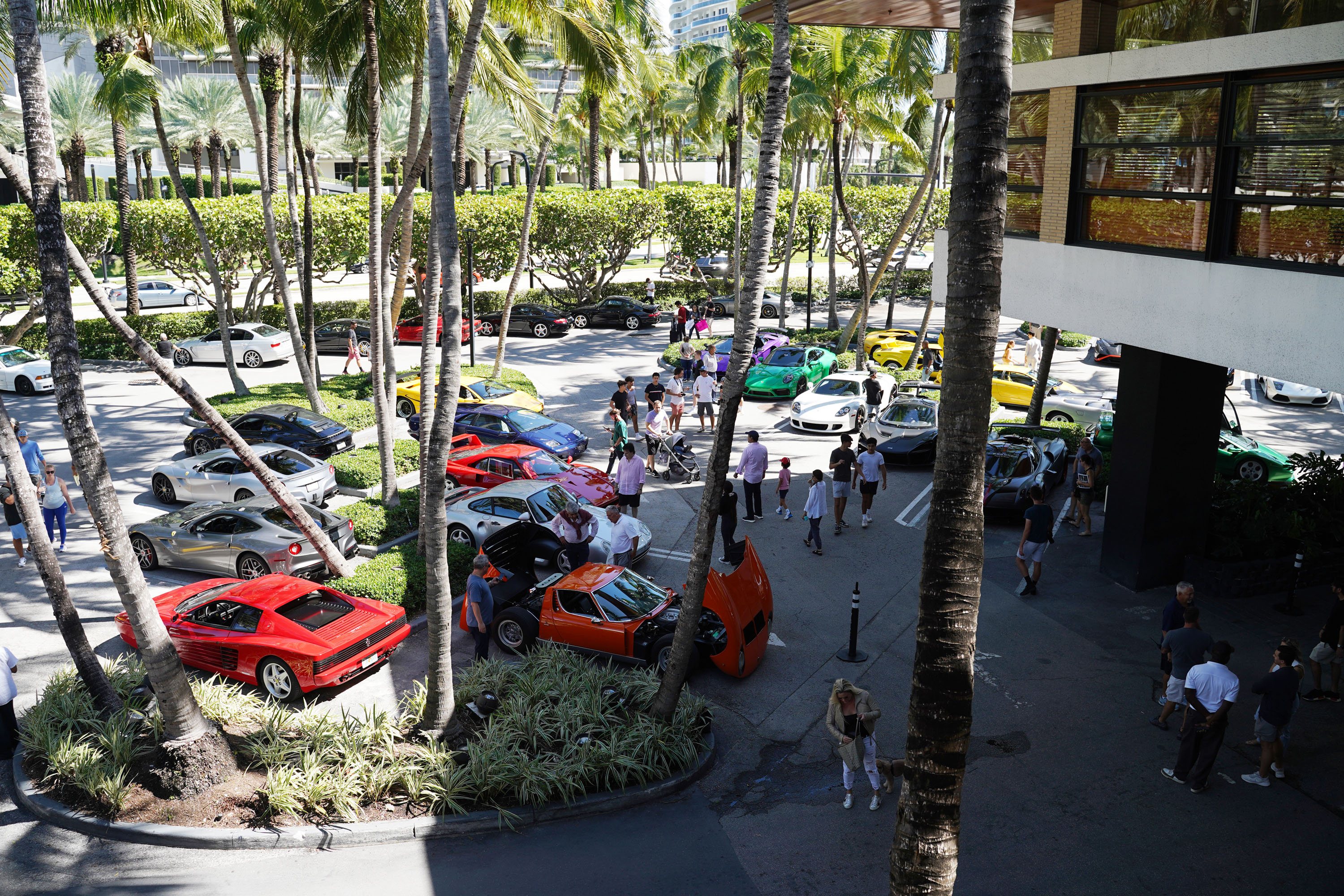 A variety of images showcasing the Collector’s Car Show hosted by Bal Harbour Shops during Bespoke Bal Harbour. Images include guests in attendance, rare and exotic cars showcased at the event, and watched from Richard Mille.