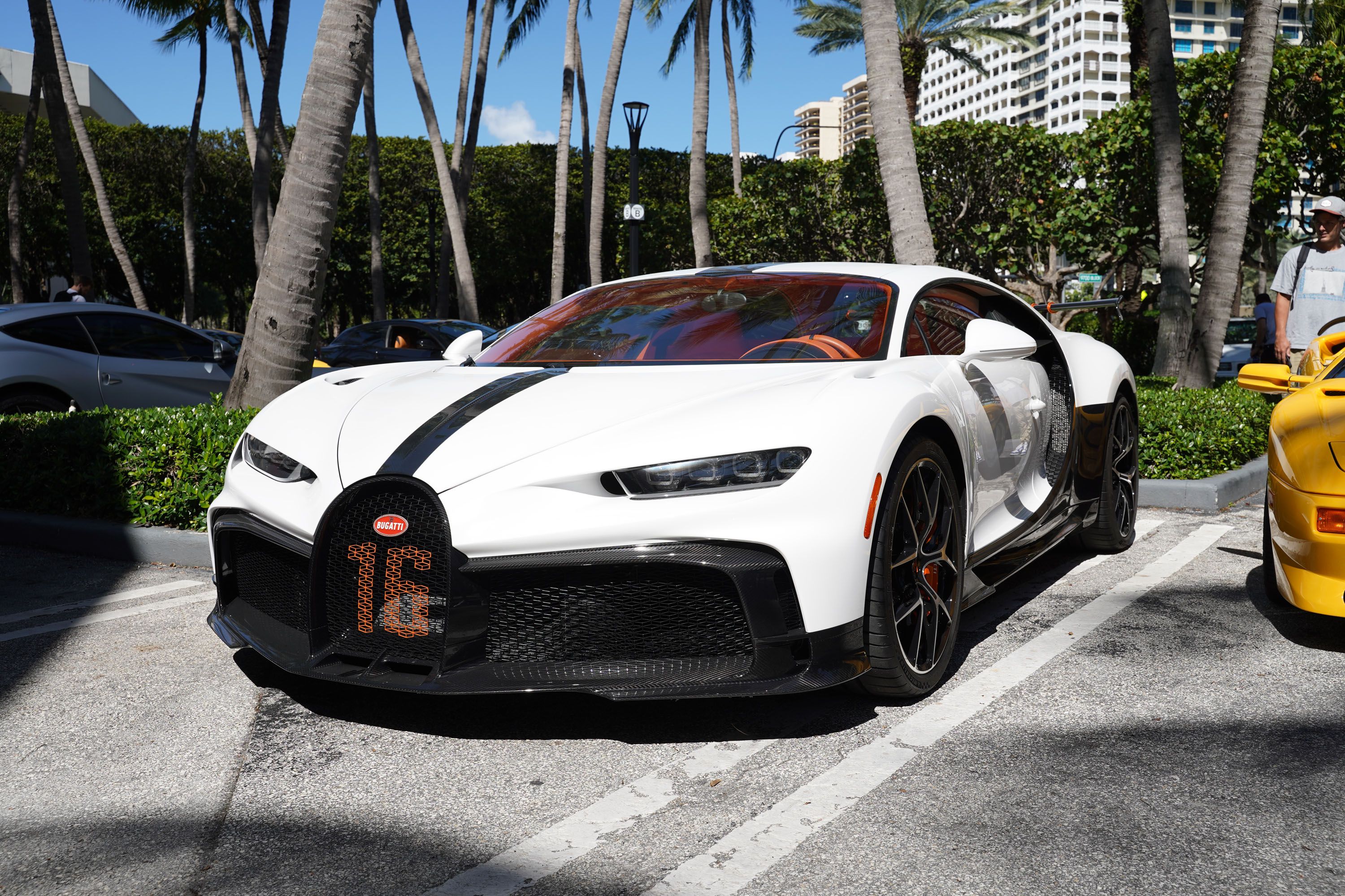 A variety of images showcasing the Collector’s Car Show hosted by Bal Harbour Shops during Bespoke Bal Harbour. Images include guests in attendance, rare and exotic cars showcased at the event, and watched from Richard Mille.