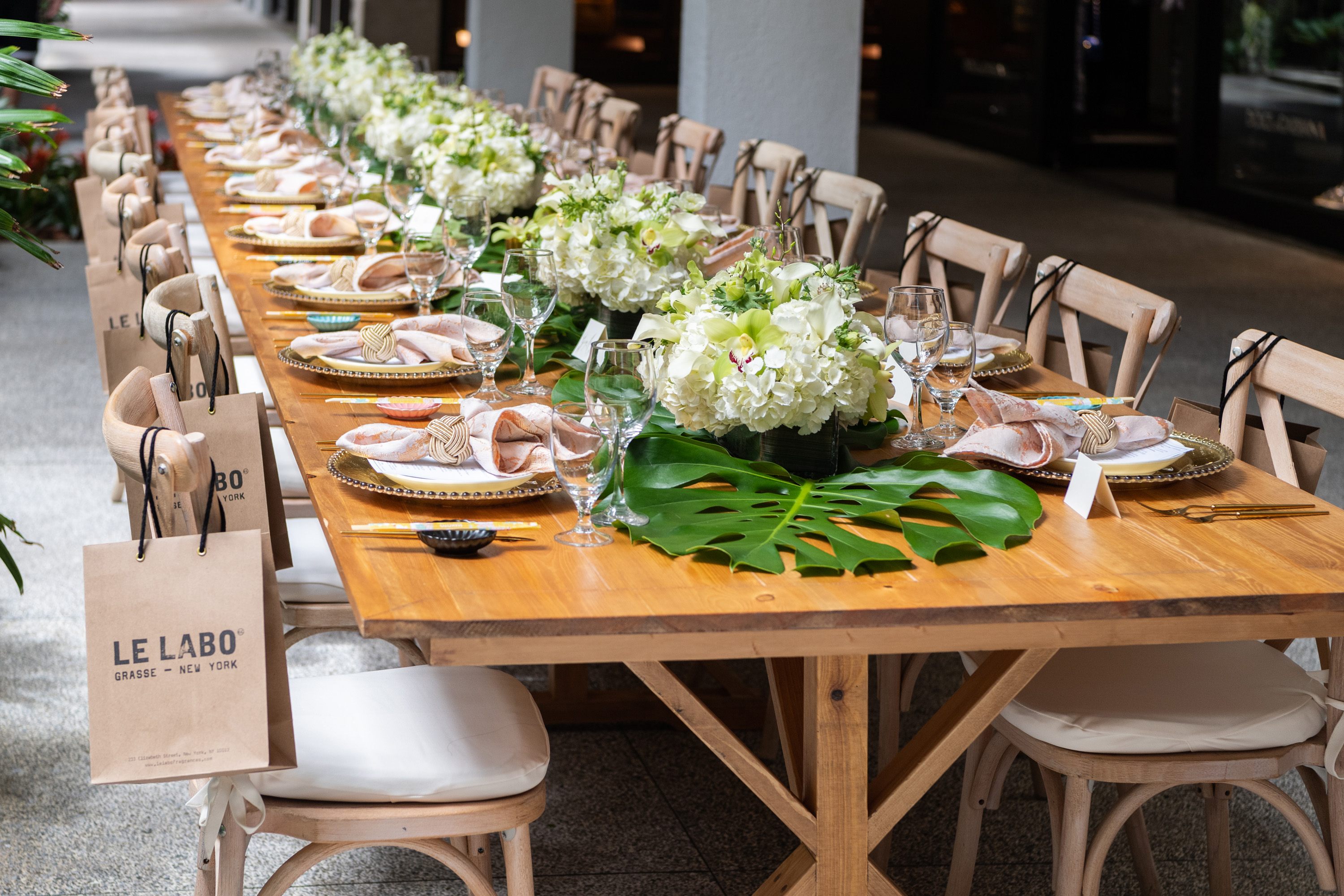 A variety of images showcasing “A Taste of Bal Harbour Shops”. Images include guests in attendance, table décor, and food featured at the event.