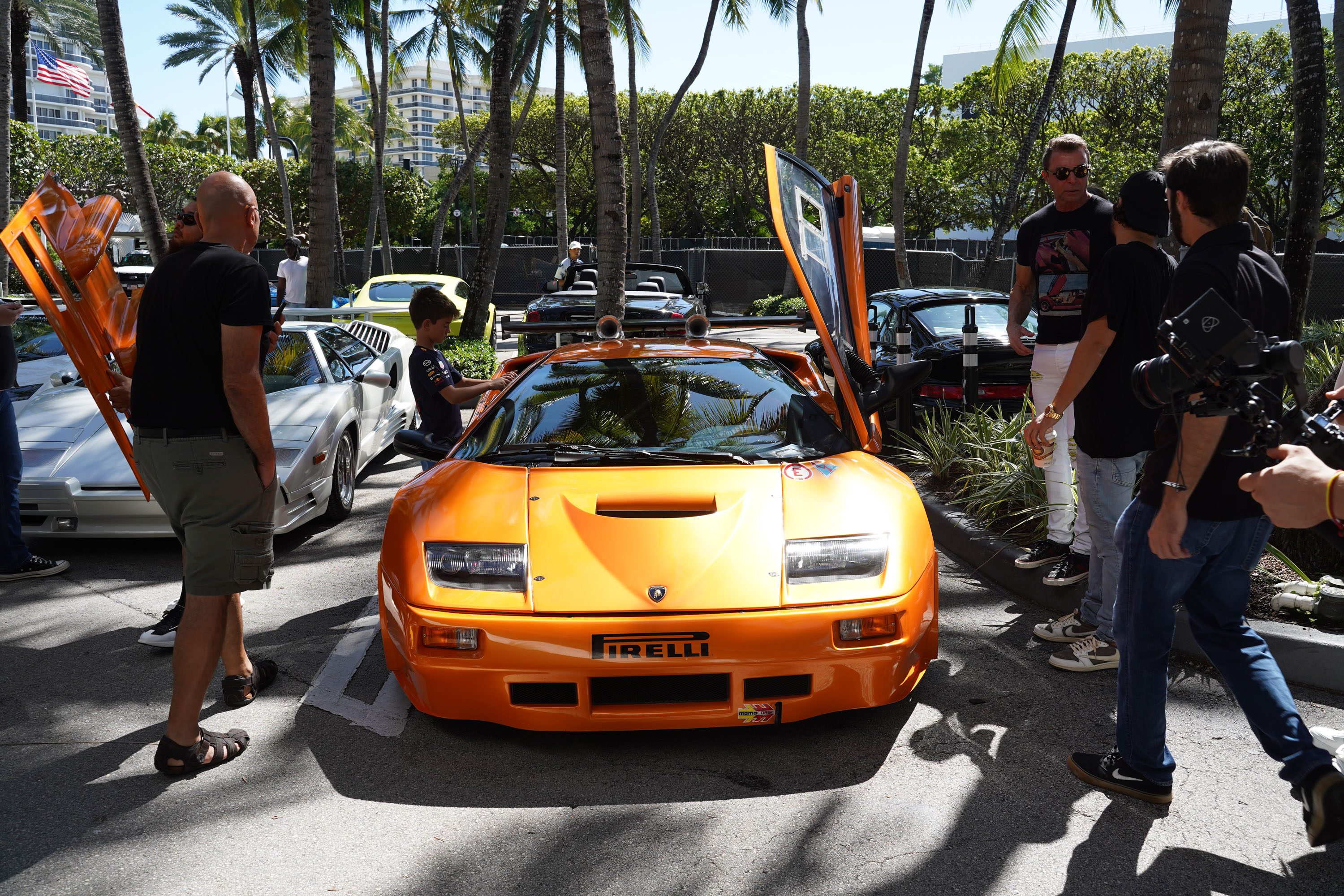 A variety of images showcasing the Collector’s Car Show hosted by Bal Harbour Shops during Bespoke Bal Harbour. Images include guests in attendance, rare and exotic cars showcased at the event, and watched from Richard Mille.